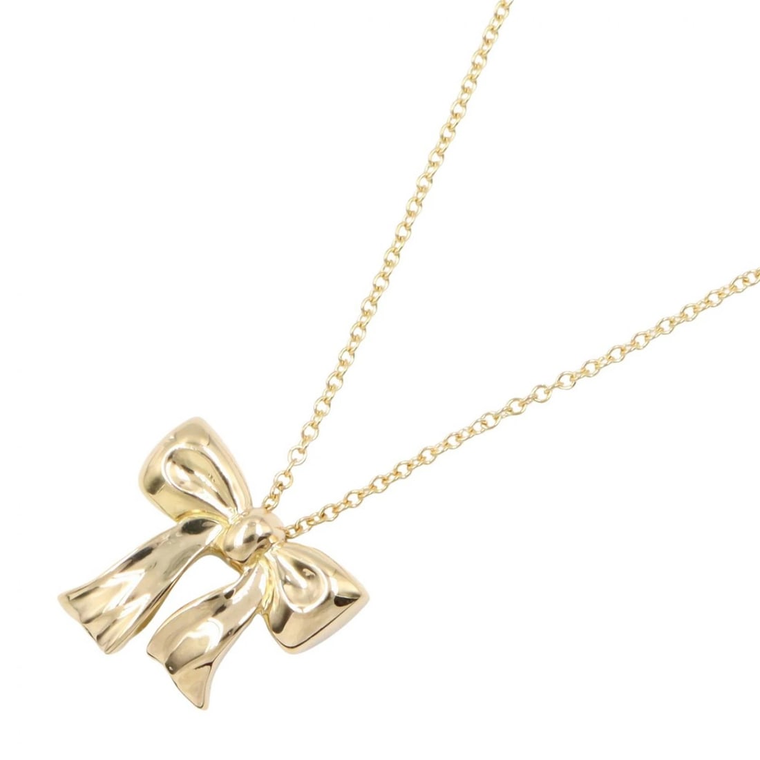 TIFFANY?CO RIBBON NECKLACE PENDANT 18KYG: TIFFANY?CO Ribbon Necklace Pendant 18KYG Brand: TIFFANY?CO Type/Style: Necklace Material: K18 (Yellow Gold), Color: Gold Size: Size Neck rotation?41.5cm(16.3") Motif W?15mm x H?14mm(0.6" x 0.6") A