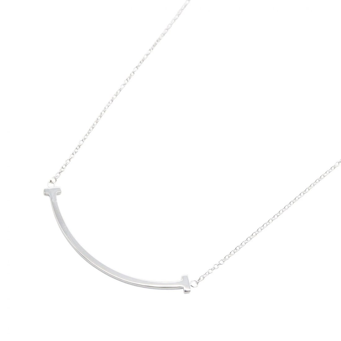 TIFFANY?CO T SMILE SMALL NECKLACE PENDANT: TIFFANY?CO T Smile Small Necklace Pendant Brand: TIFFANY?CO Type/Style: Necklace Material: K18WG?White Gold?, Color: Silver Size: Size Neck rotation?40.5/45.5cm(15.9") Motif W?37mm x H?3mm(1.5" x 0.1"