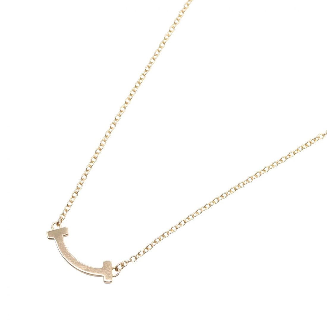TIFFANY?CO T SMILE MINI NECKLACE PENDANT: TIFFANY?CO T Smile Mini Necklace Pendant Brand: TIFFANY?CO Type/Style: Necklace Material: K18PG?Rose Gold?, Color: Gold Size: Size Neck rotation?41/45.5cm(16.1") Motif W?13mm x H?3mm(0.5" x 0.1")