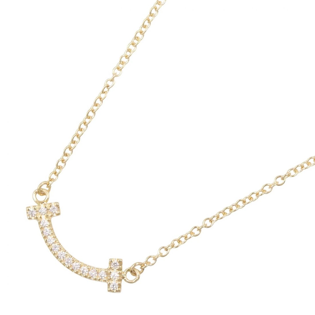 TIFFANY?CO T SMILE MINI DIAMOND NECKLACE PENDANT: TIFFANY?CO T Smile Mini Diamond Necklace pendant Brand: TIFFANY?CO Type/Style: Necklace Material: K18 (Yellow Gold), Color: Gold Size: Size Neck rotation?40.5/45cm(15.9") Motif W?13mm x H?3mm(0.5" x