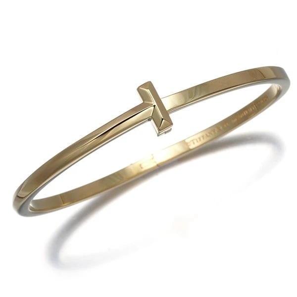 TIFFANY&CO. BRACELET TIFFANY T1 NARROW BANGLE HINGED 18K 750 YELLOW GOLD: Tiffany&Co. Bracelet Tiffany T1 Narrow Bangle Hinged 18K 750 Yellow Gold Brand: Tiffany & Co. Type/Style: Bracelet Material: 18K/ 750 Yellow Gold, Color: Yellow Gold Size: Inner circumference: 15cm De