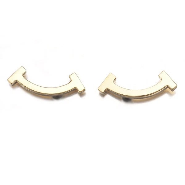 TIFFANY&CO. EARRINGS TIFFANY T SMILE MINI 18K 750 YELLOW GOLD: Tiffany&Co. Earrings Tiffany T Smile Mini 18K 750 Yellow Gold Brand: Tiffany & Co. Type/Style: Earring Material: 18K /750 Yellow Gold, Color: Yellow Gold Size: Design size: 4.5 x 13.5mm Accessorie