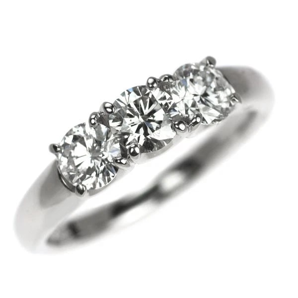 TRILOGY PT900 DIAMOND RING: Trilogy Pt900 Diamond Ring Brand: None Type/Style: Ring Material: Pt900, Main Stone Natural Color: None Size: 5.25 US Accessories: None Accessories Notice: When purchasing pre-owned goods, please