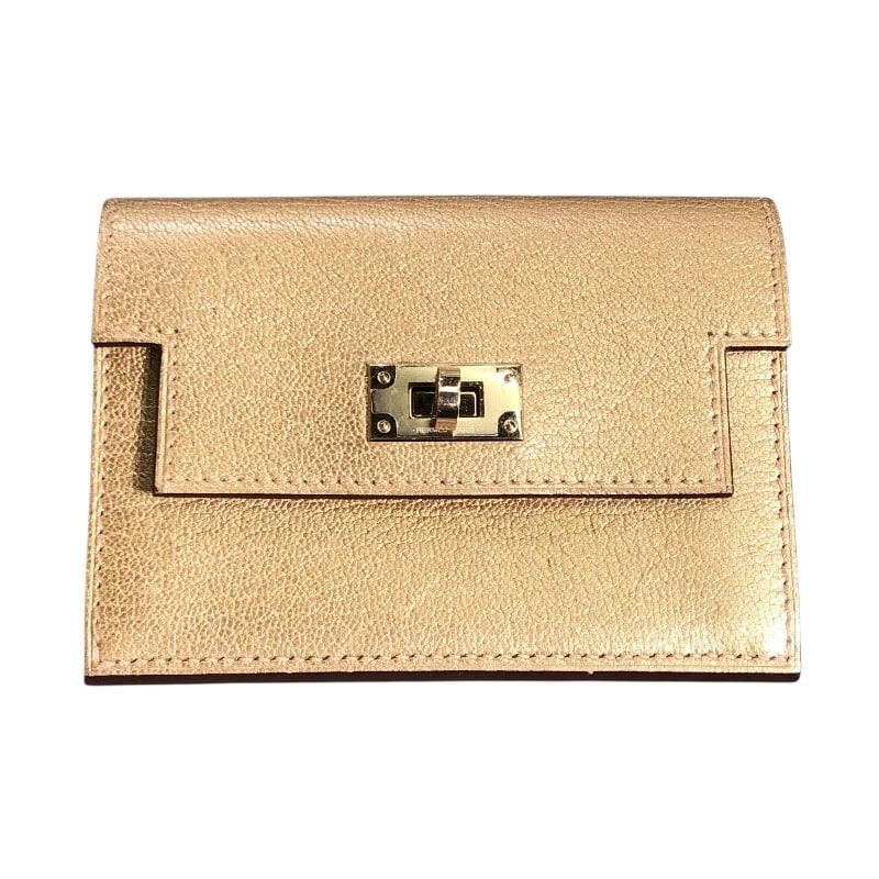 HERMES KELLY POCKET SLIM COIN PURSE: HERMES Kelly Pocket Slim coin purse Brand: HERMES Type/Style: coin purse Material: Chevre Shamquilla Color: Dre GoldHardware Size: W5.1 x H3.7x D0.6inch Accessories: None Accessories Notice: When