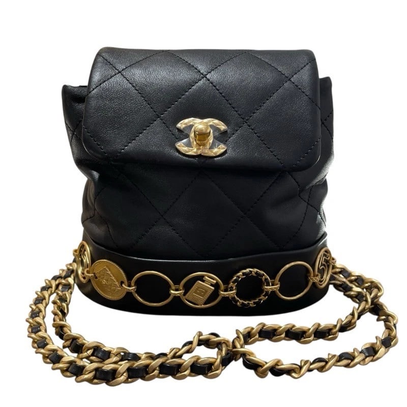 CHANEL CHAINBACKPACK: CHANEL ChainBackpack Brand: CHANEL Type/Style: Backpack ?? Daypack Material: lambskin Color: Black GD Hardware Size: W7.1 x H5.9x D0.0inch Accessories: None Accessories Notice: When purchasing