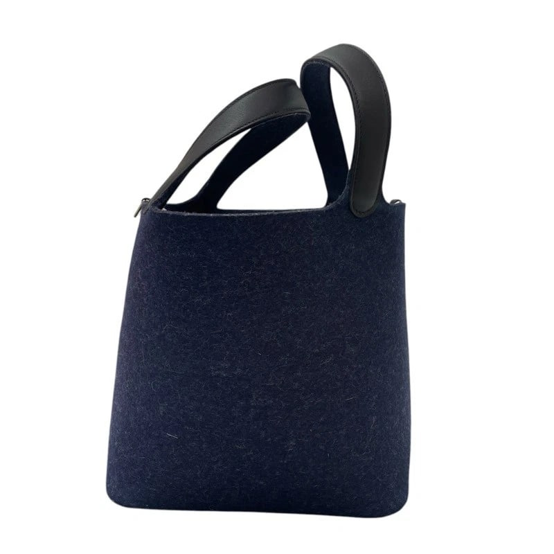 HERMES PICO TAN LOCK MM HANDBAG: HERMES Pico Tan Lock MM Handbag Brand: HERMES Type/Style: Handbag Material: felt Color: Bleu Nui SilverHardware Size: W6.7 x H8.7x D8.7inch Accessories: None Accessories Notice: When purch