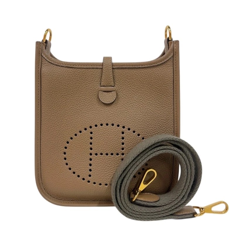 HERMES EVELYN SHOULDER BAG: HERMES Evelyn Shoulder Bag Brand: HERMES Type/Style: Shoulder Bag Material: Taurillon Clemence Color: Beige de Weimar Gold Hardware Size: W6.9 x H7.9x D2.0inch Accessories: None Accessorie