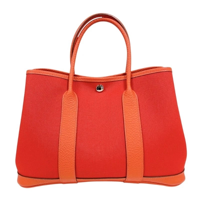 HERMES GARDEN PARTY HANDBAG: HERMES Garden party Handbag Brand: HERMES Type/Style: Handbag Material: Toile / Negonda Color: Rouge Tomato Capucines Size: W11.8 x H8.3x D5.1inch Accessories: None Accessories Notice: Whe