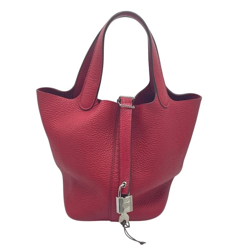 HERMES PICOTAN LOCK PM HANDBAG: HERMES Picotan Lock PM Handbag Brand: HERMES Type/Style: Handbag Material: Taurillon Clemence Color: Rouge Kazak SilverHardware Size: W7.1 x H7.1x D5.1inch Accessories: None Accessories No