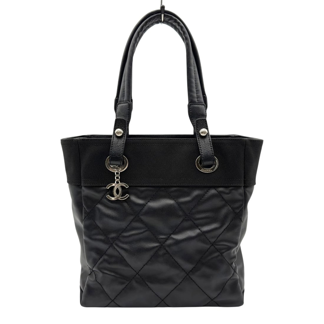 CHANEL PARIS BIARRITZ TOTE PM 17TOTE BAG: CHANEL Paris Biarritz Tote PM 17Tote Bag Brand: CHANEL Type/Style: Tote Bag Material: Coated canvas Color: Black SilverHardware Size: W9.8 x H10.2x D4.1inch Accessories: None Accessories N