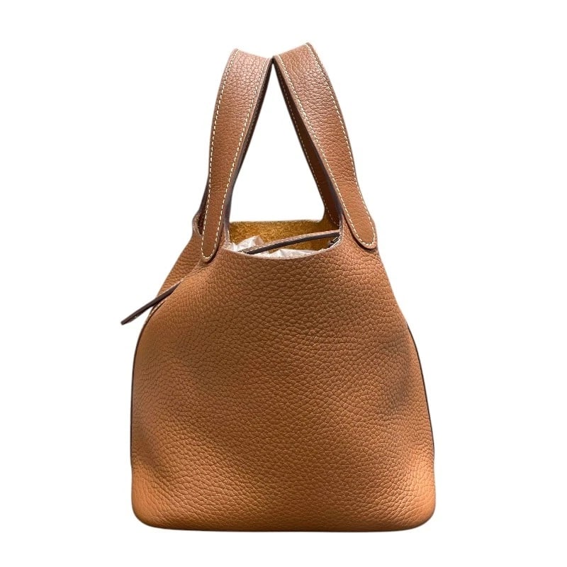 HERMES PICOTAN LOCK PM HANDBAG: HERMES Picotan Lock PM Handbag Brand: HERMES Type/Style: Handbag Material: Taurillon Clemence Color: Gold/SilverHardware Size: W7.1 x H7.5x D5.3inch Accessories: None Accessories Notice: When