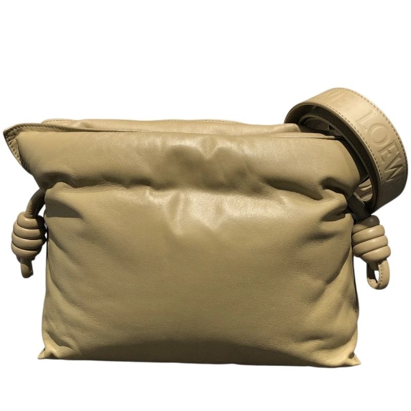 LOEWE FLAMENCO CLUTCH PUFFER SHOULDER BAG: LOEWE Flamenco Clutch Puffer Shoulder Bag Brand: LOEWE Type/Style: Shoulder Bag Material: Ram Color: Clay Size: W11.4 x H8.5x D3.9inch Accessories: None Accessories Notice: When purchasing pre-owned