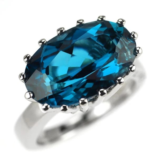 CELINE PT900 BLUE TOPAZ RUBY RING: Celine Pt900 blue topaz ruby ring Brand: None Type/Style: Ring Material: Pt900, Main Stone topaz/ ruby Color: None Size: 4.75 - 5 US Accessories: None Accessories Notice: When purchasing pre-owned