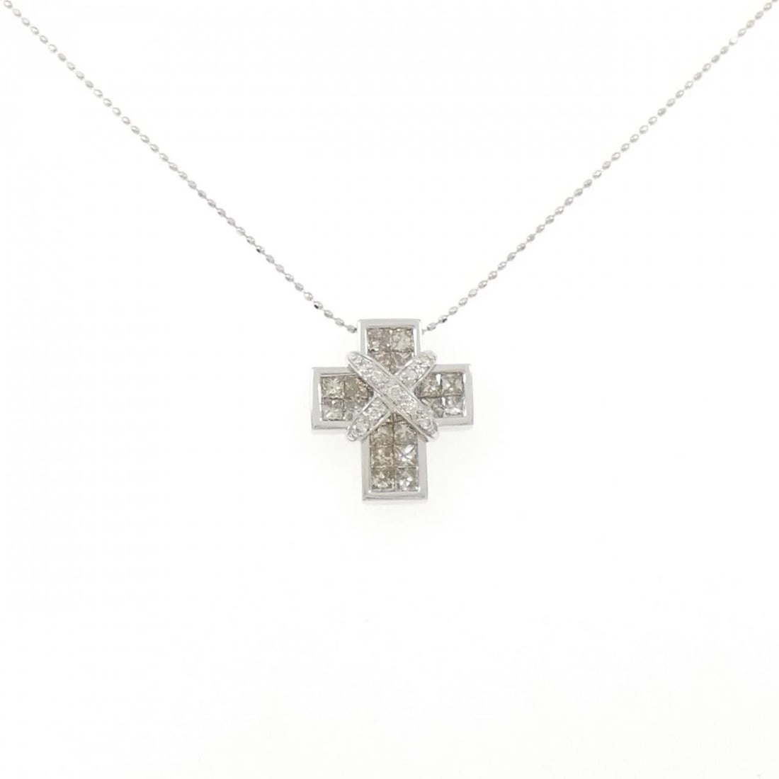 KASAHARA MASUMI CROSS DIAMOND NECKLACE: Kasahara Masumi Cross Diamond Necklace Brand: Masumi Kasahara Type/Style: Kasahara Masumi Necklace Material: K18 white gold, Main Stone Natural Color: WG Size: Length: 45cm Accessories: None