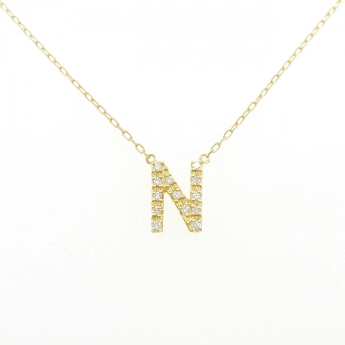 K18YG INITIAL N DIAMOND NECKLACE: K18YG Initial N Diamond Necklace Brand: Unbranded Type/Style: Diamond Necklace Material: K18 yellow gold, Main Stone Natural Color: YG Size: Length: 41cm Accessories: None Accessories Notice: When