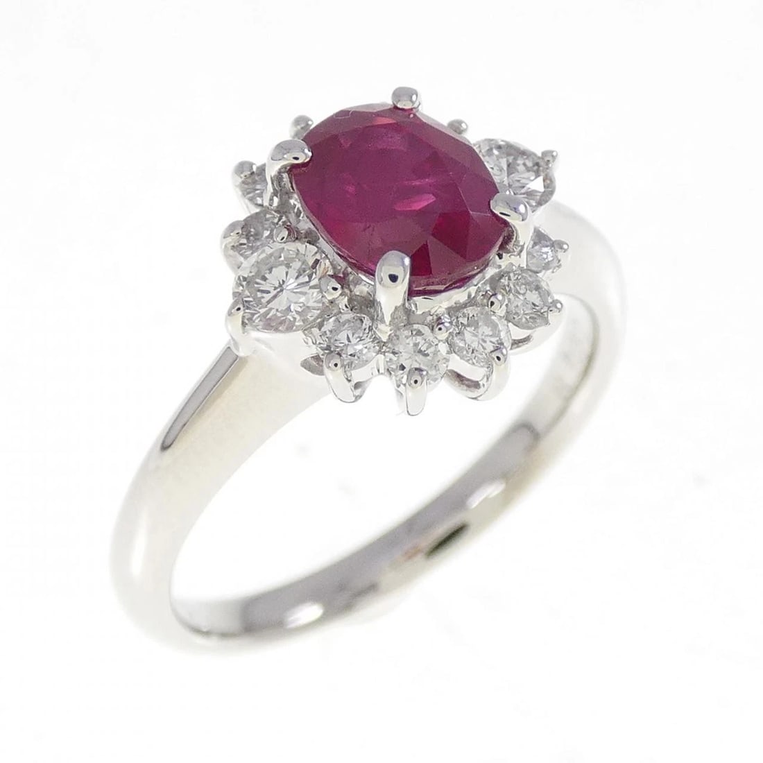 PT900 RUBY RING BURMESE: PT900 Ruby Ring Burmese Brand: Unbranded Type/Style: Ruby Ring Material: Platinum900, Main Stone Ruby, Natural Color: PT Size: US6 1/4 Accessories: None Accessories Notice: When purchasing