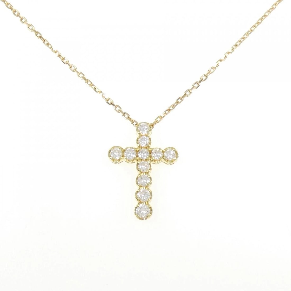 K18YG CROSS DIAMOND NECKLACE: K18YG Cross Diamond Necklace Brand: Unbranded Type/Style: Diamond Necklace Material: K18 yellow gold, Main Stone Natural Color: YG Size: Length: 45cm Accessories: None Accessories Notice: When