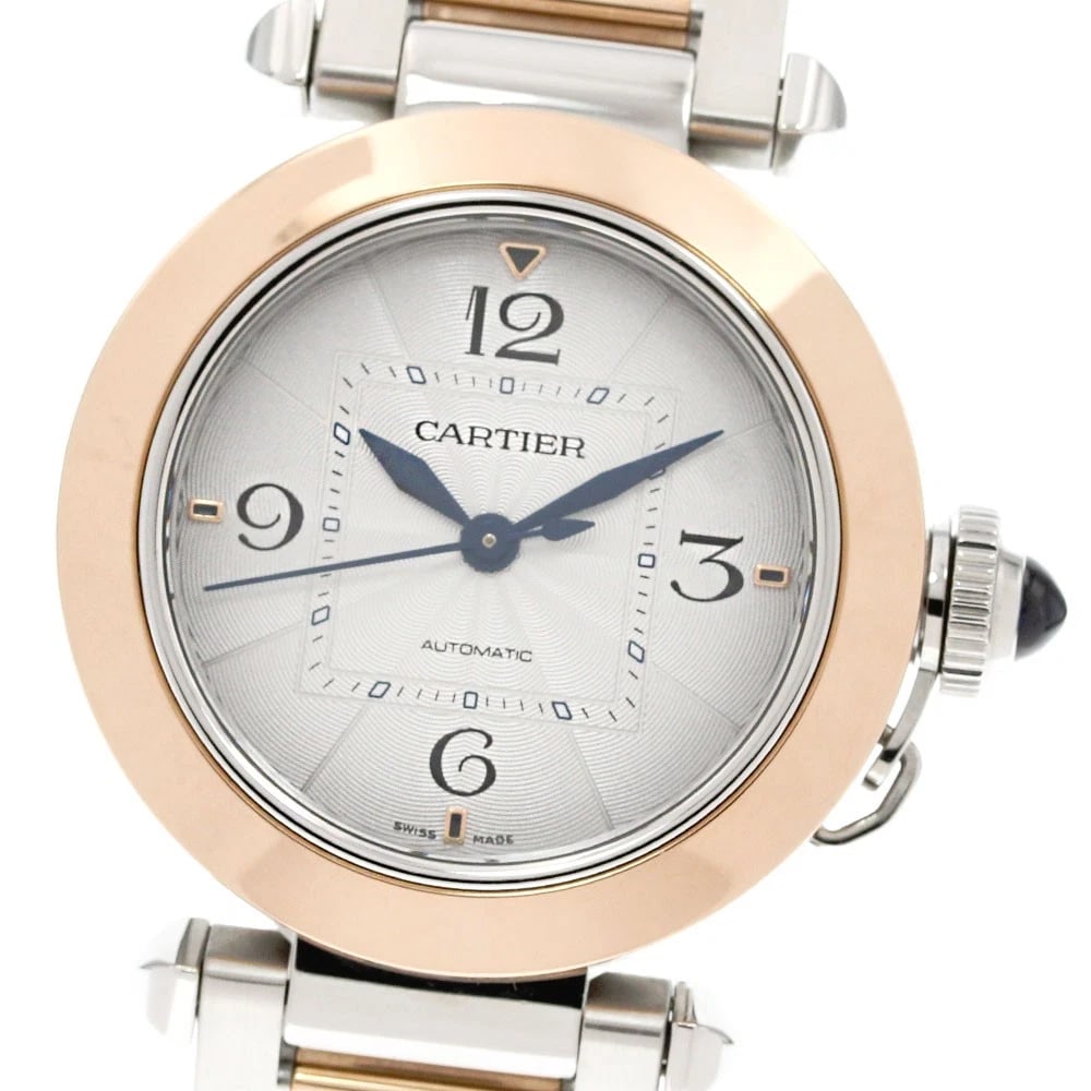 CARTIER PASHA DE CARTIER STAINLESS STEEL/PG AUTOMATIC WATCH: CARTIER Pasha de Cartier Stainless Steel/PG Automatic Watch Brand: CARTIER Type/Style: Wristwatch Material: Band Material Stainless Steel/PG, Case Material Stainless Steel/PG Color: Dial Color Silver 