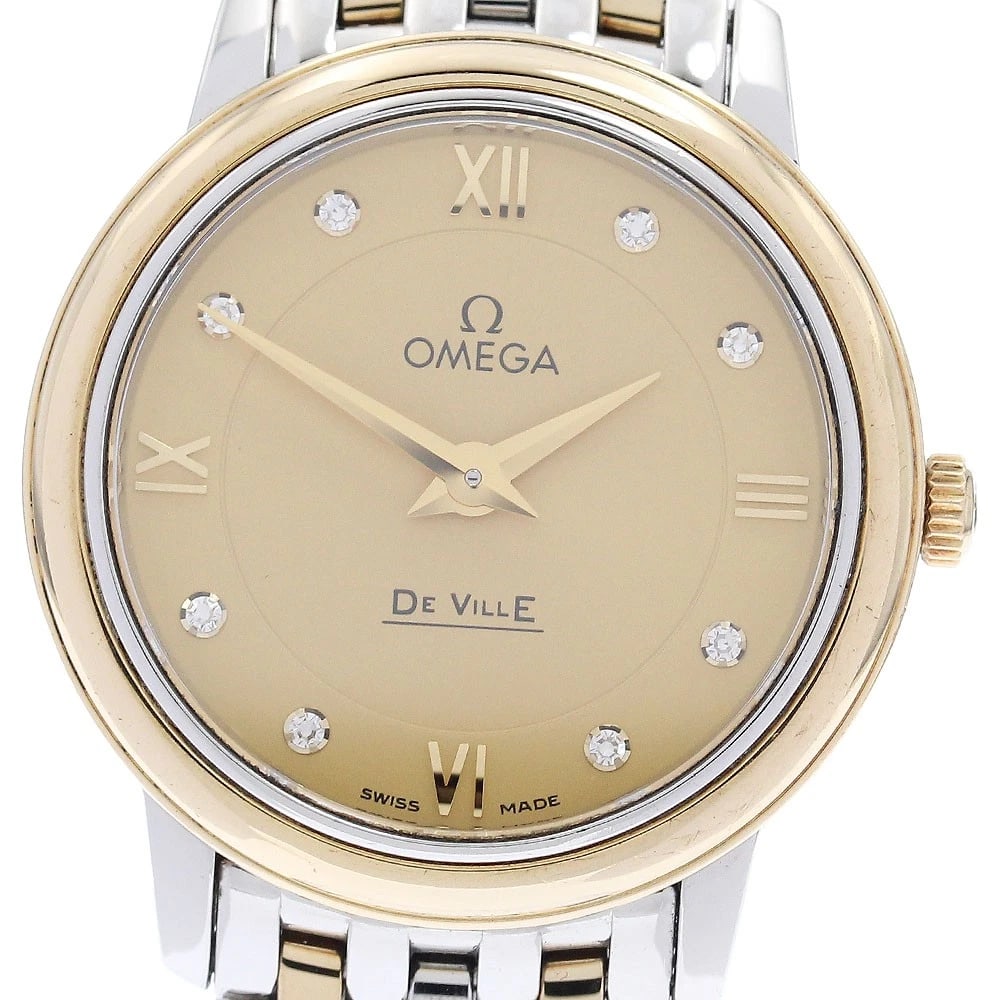 OMEGA DE VILLE PRESTIGE DIAMOND QUARTZ WATCH: OMEGA De Ville Prestige diamond Quartz Watch Brand: OMEGA Type/Style: Wristwatch Material: Band Material Stainless Steel/YG, Case Material Stainless Steel/YG Color: Dial Color gold Size: Case Size Abo