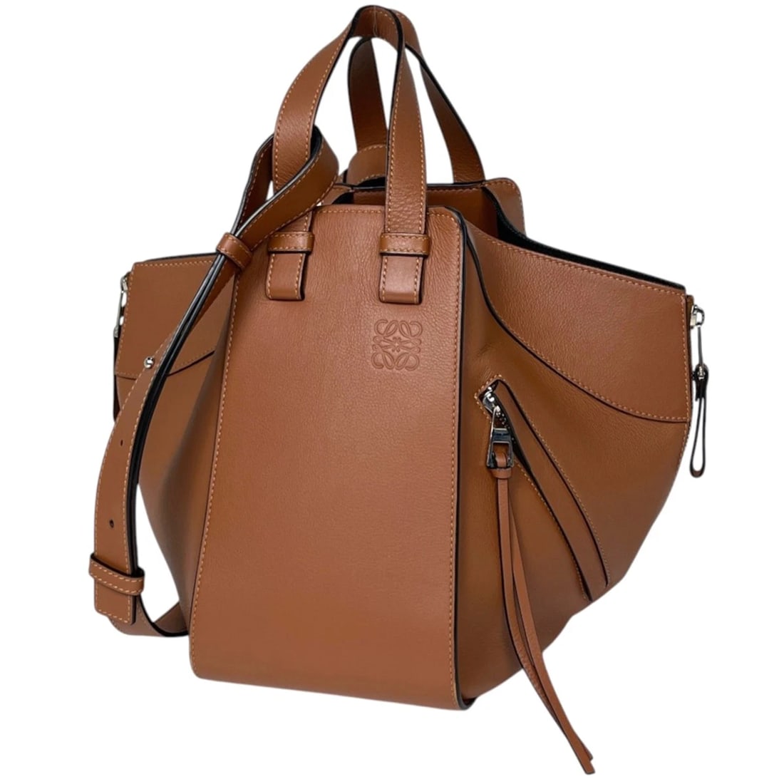 LOEWE HAND BAG HAMMOCK BAG: Loewe Hand Bag Hammock Bag Brand: LOEWE Type/Style: Hand Bag Material: leather Color: Brown Size: Width 14cm(5.5inch) Height 24cm(9.4inch) Depth 27cm(10.6inch) Accessories: None Accessories Notice: