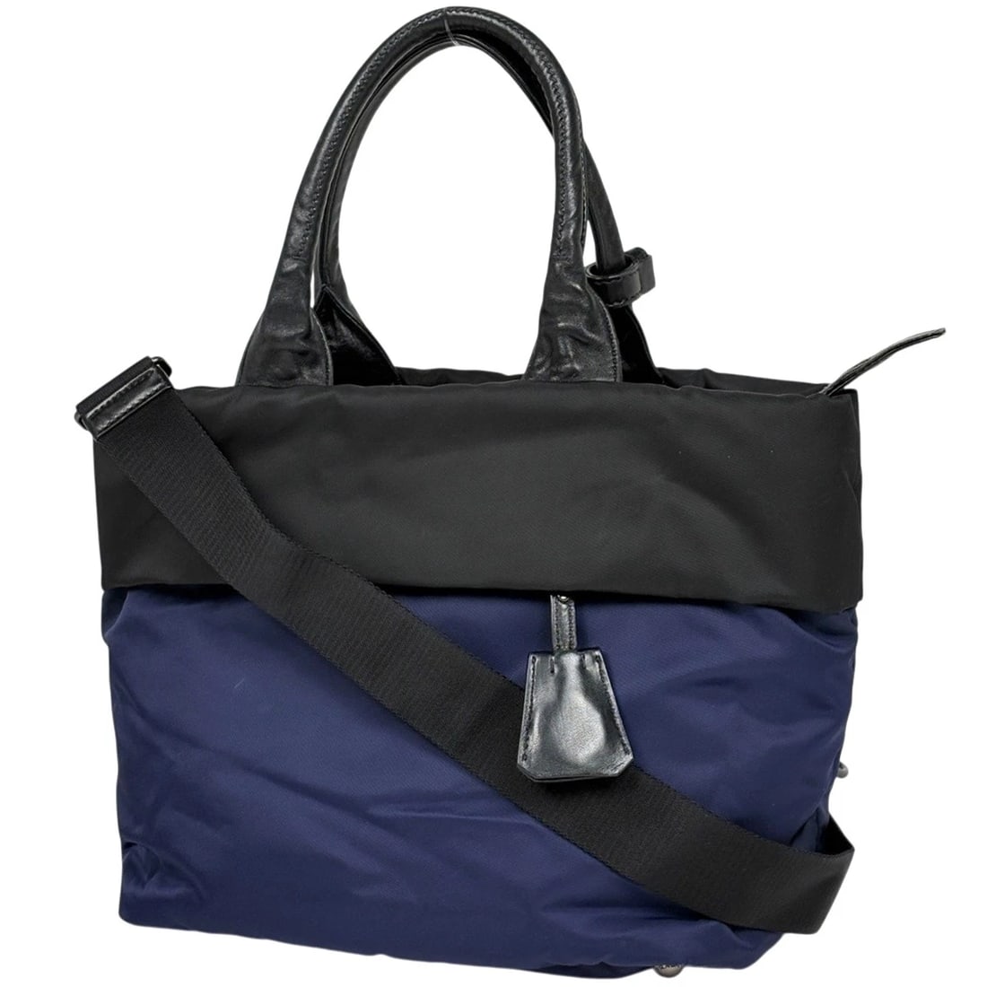 PRADA WITH LOGO HAND BAG: PRADA with logo Hand Bag Brand: PRADA Type/Style: Hand Bag Material: Test nylon ?leather Color: Navy blue Nero Size: Width 27cm(10.6inch) Height 25cm(9.8inch) Depth 17cm(6.7inch) Accessories: None