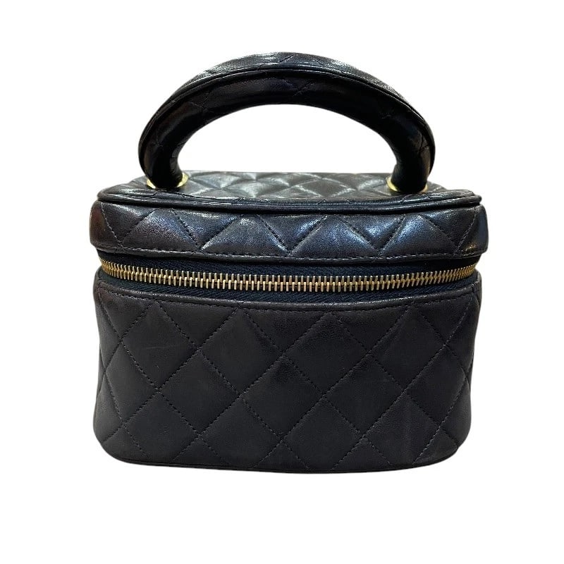 CHANEL TOP-HANDLE VANITY HANDBAG: CHANEL Top-handle vanity Handbag Brand: CHANEL Type/Style: Handbag Material: lambskin Color: Black Gold Hardware Size: W6.5 x H4.3x D6.5inch Accessories: None Accessories Notice: When purchasing