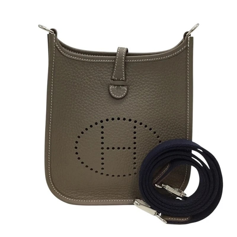 HERMES EVELYN SHOULDER BAG: HERMES Evelyn Shoulder Bag Brand: HERMES Type/Style: Shoulder Bag Material: Taurillon Clemence Color: Etube Size: W5.5 x H7.7x D2.0inch Shoulder:43.7inch Accessories: None Accessories Noti