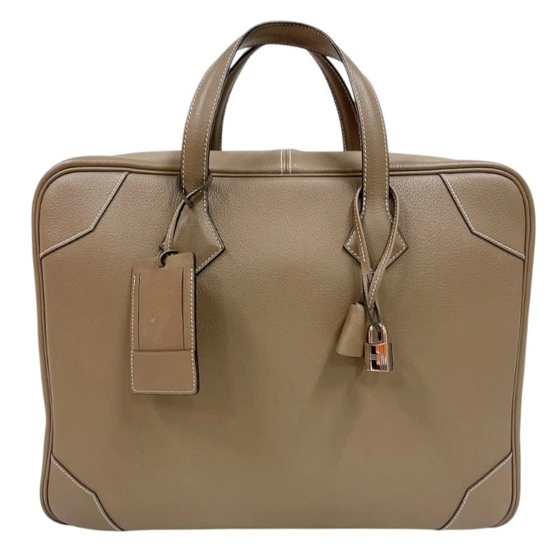 HERMES VICTORIA BUSINESS BAG: HERMES Victoria Business bag Brand: HERMES Type/Style: Business bag Material: Taurillon Clemence Color: Etop SilverHardware Size: W15.7 x H12.6x D3.9inch Accessories: None Accessories Notice: When