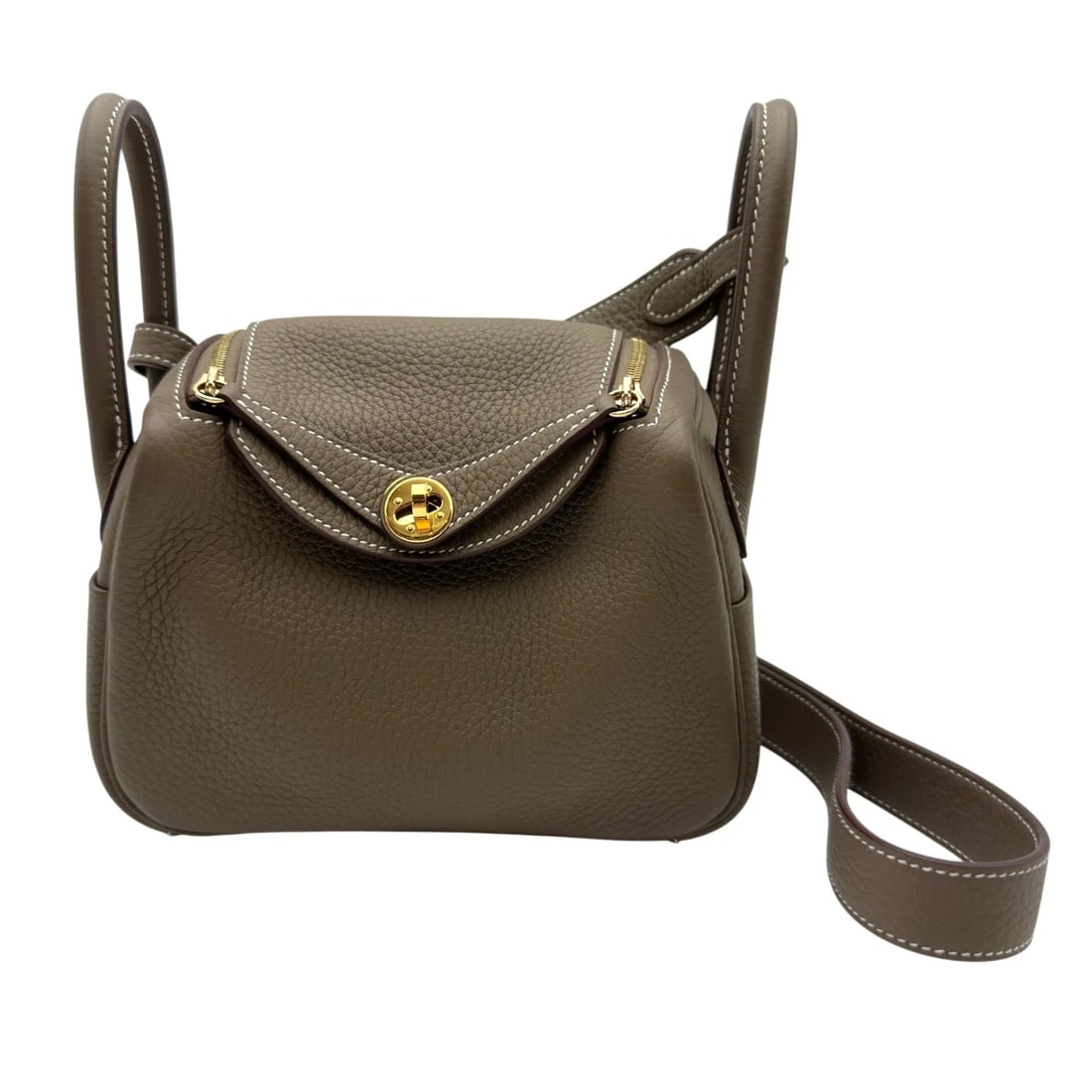 HERMES LINDY MINI SHOULDER BAG: HERMES Lindy mini Shoulder Bag Brand: HERMES Type/Style: Shoulder Bag Material: Taurillon Clemence Color: Etoupe GoldHardware Size: W7.3 x H4.9x D3.5inch Accessories: None Accessories Noti
