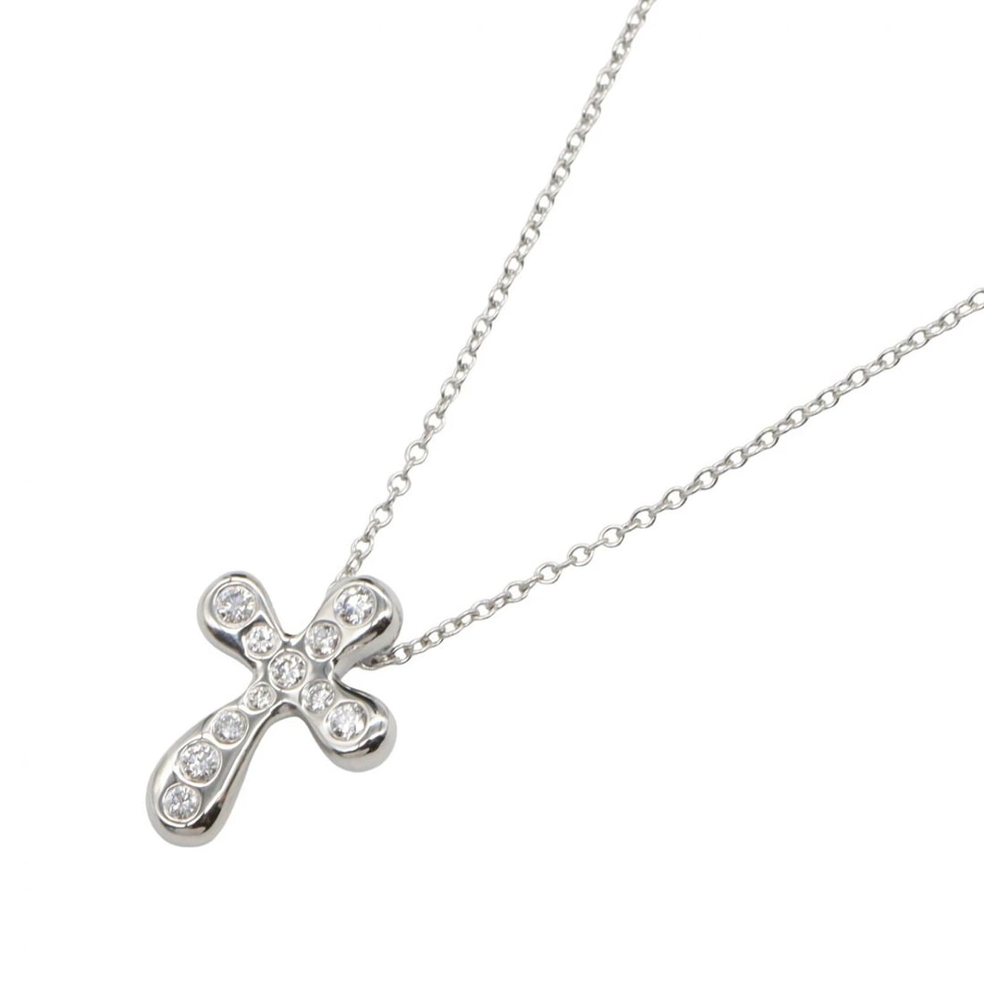TIFFANY?CO SMALL CROSS DIAMOND NECKLACE PENDANT: TIFFANY?CO Small Cross Diamond Necklace pendant Brand: TIFFANY?CO Type/Style: Necklace Material: Pt950 Platinum, Color: Silver Size: Size Neck rotation?41cm(16.1") Motif W?12mm x H?16mm(0.5" x 0.6")