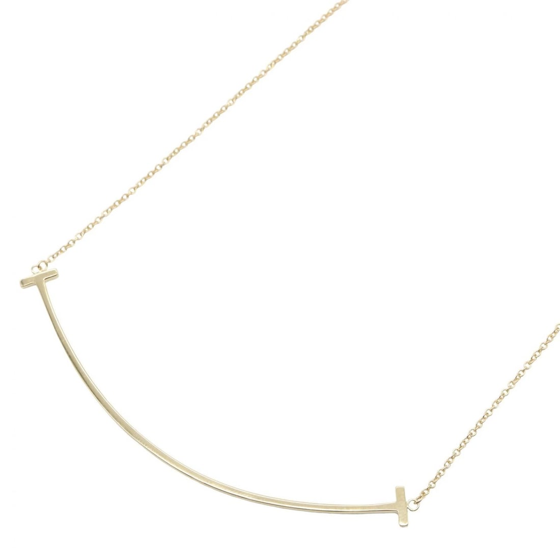 TIFFANY?CO T SMILE LARGE NECKLACE PENDANT: TIFFANY?CO T Smile Large Necklace Pendant Brand: TIFFANY?CO Type/Style: Necklace Material: K18 (Yellow Gold), Color: Gold Size: Size Neck rotation?40.5/45cm(15.9") Motif W?67mm x H?6mm(2.6" x 0.2")