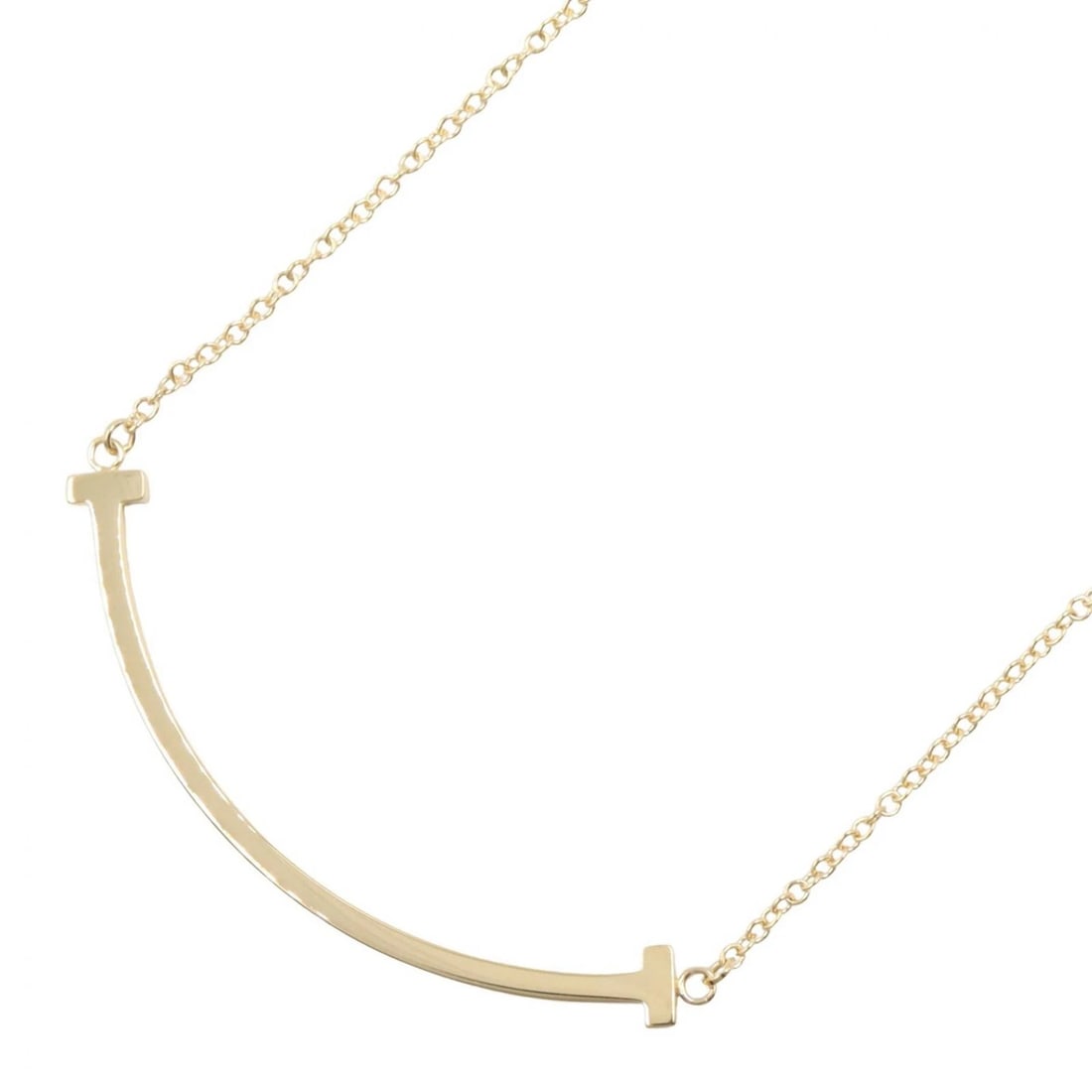 TIFFANY?CO T SMILE SMALL NECKLACE PENDANT: TIFFANY?CO T Smile Small Necklace Pendant Brand: TIFFANY?CO Type/Style: Necklace Material: K18 (Yellow Gold), Color: Gold Size: Size Neck rotation?40/45cm(15.7") Motif W?37mm x H?3mm(1.5" x 0.1")