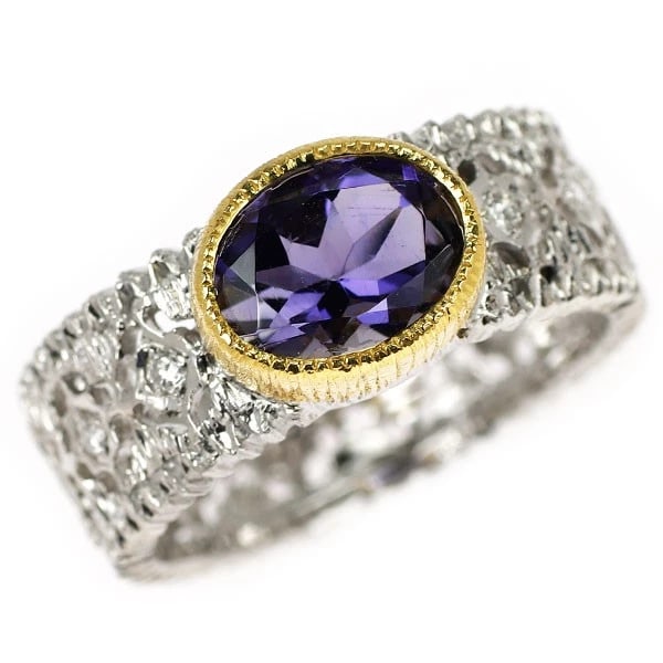 K18YG/WG IOLITE DIAMOND RING: K18YG/WG iolite diamond ring Brand: None Type/Style: Ring Material: K18YG, Main Stone Natural Color: WG Size: 6.75 - 7 US Accessories: None Accessories Notice: When purchasing pre-owned goods, please