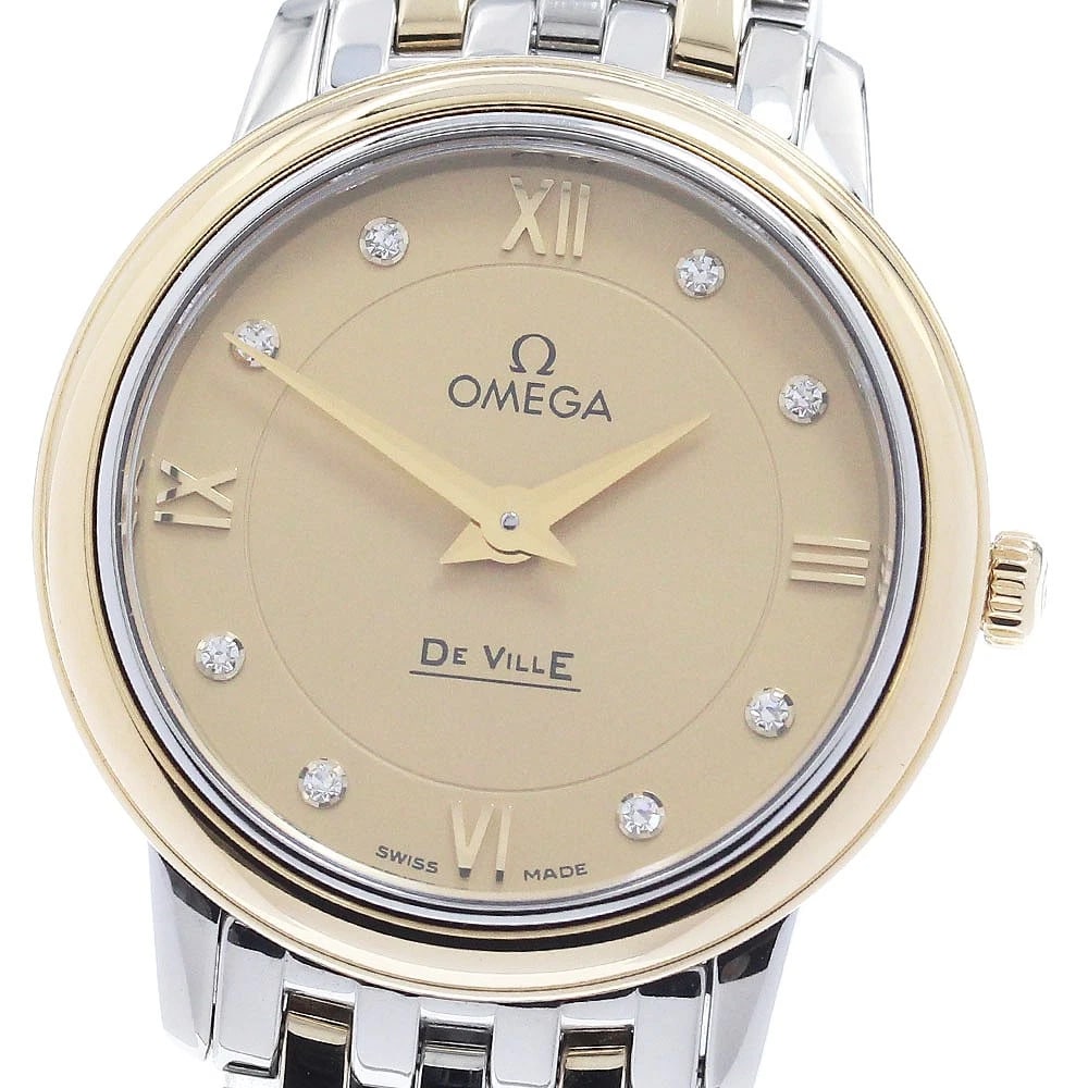 OMEGA DE VILLE PRESTIGE GOLD DIAL QUARTZ WATCH: OMEGA De Ville Prestige gold Dial Quartz Watch Brand: OMEGA Type/Style: Wristwatch Material: Band Material Stainless Steel/YG, Case Material Stainless Steel/YG Color: Dial Color gold Size: Case Size A