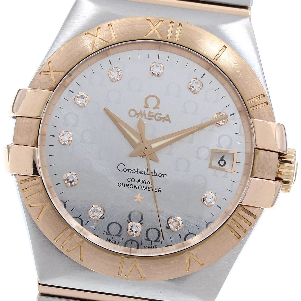 OMEGA CONSTELLATION DATE AUTOMATIC WATCH: OMEGA Constellation Date Automatic Watch Brand: OMEGA Type/Style: Wristwatch Material: Band Material Stainless Steel/RG, Case Material Stainless Steel/RG Color: Band Color Silver / Gold, Case Color