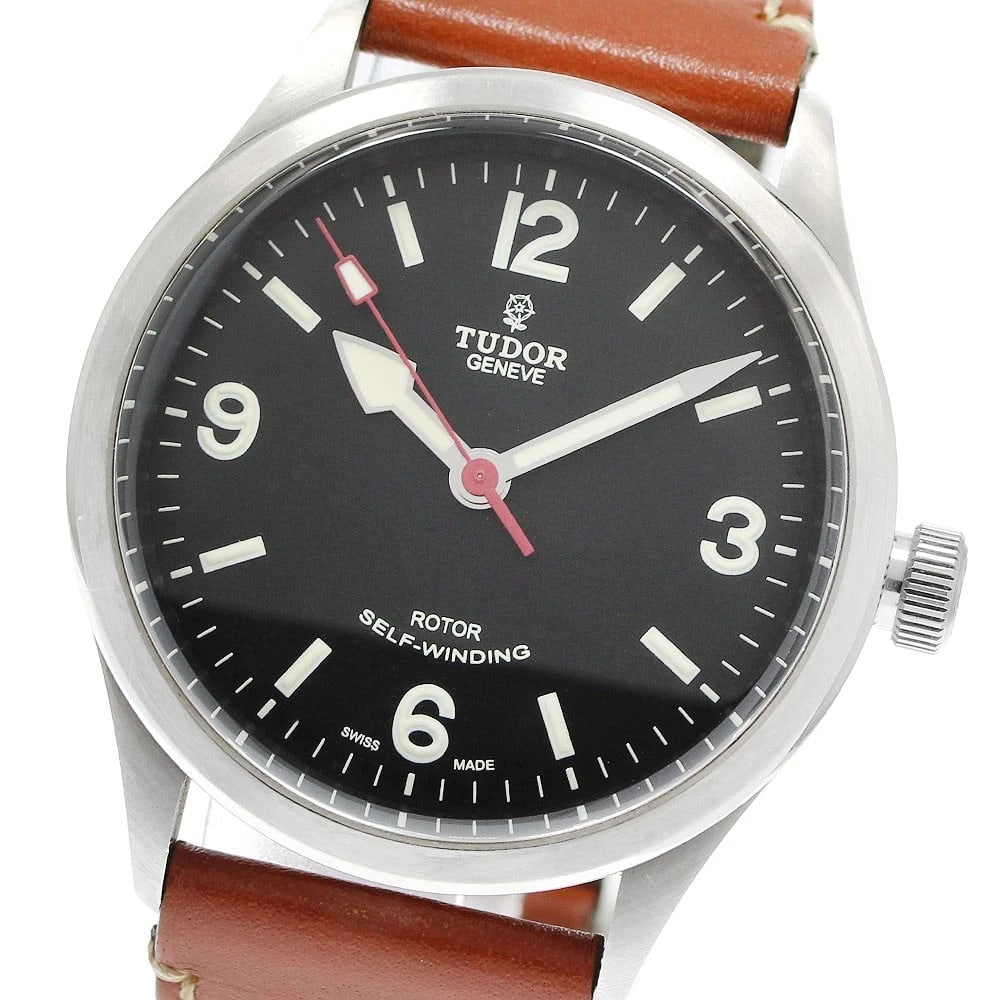 TUDOR HERITAGE RANGER BLACK DIAL AUTOMATIC WATCH: TUDOR Heritage Ranger black Dial Automatic Watch Brand: TUDOR Type/Style: Wristwatch Material: Band Material leather, Case Material Stainless Steel Color: Band Color Brown, Case Color Silver, Dial