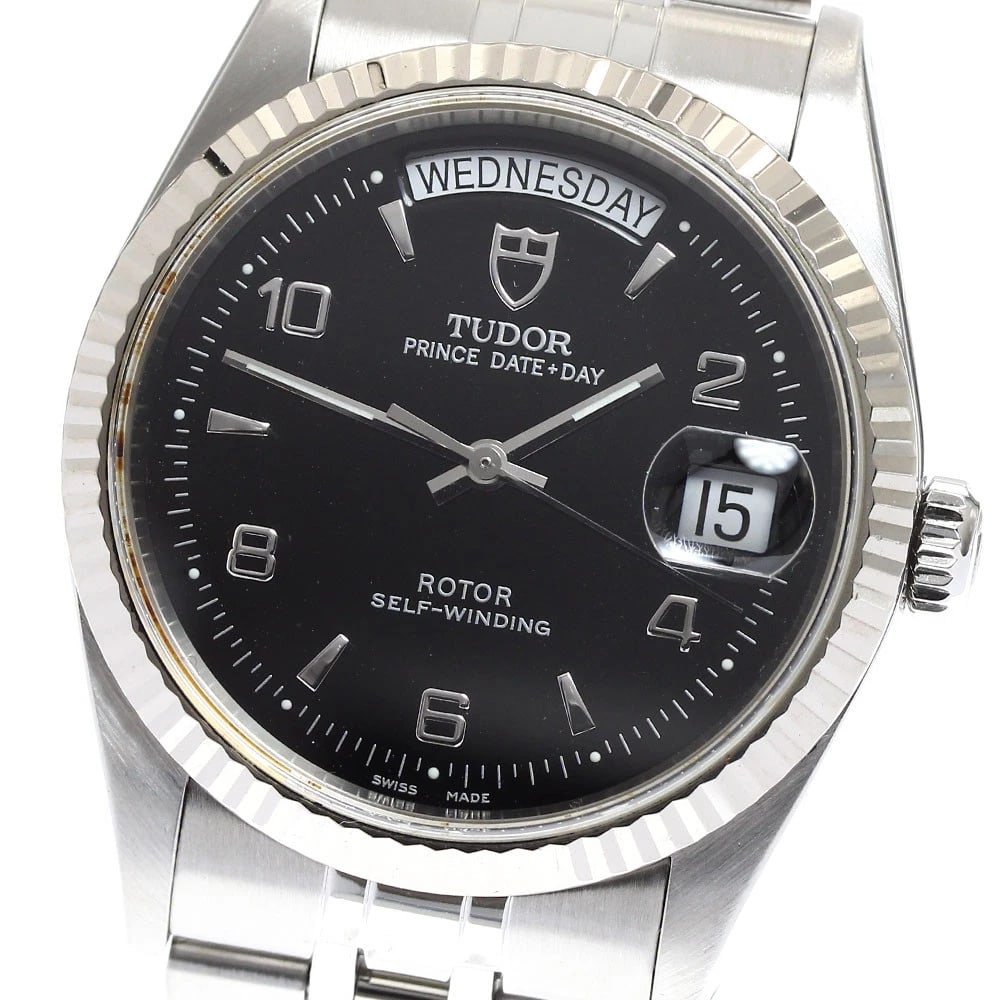 TUDOR PRINCE DATE DAY WG BEZEL BLACK DIAL AUTOMATIC WATCH: TUDOR Prince Date Day WG bezel black Dial Automatic Watch Brand: TUDOR Type/Style: Wristwatch Material: Band Material Stainless Steel, Case Material Stainless Steel/WG Color: Band Color Silver, Case
