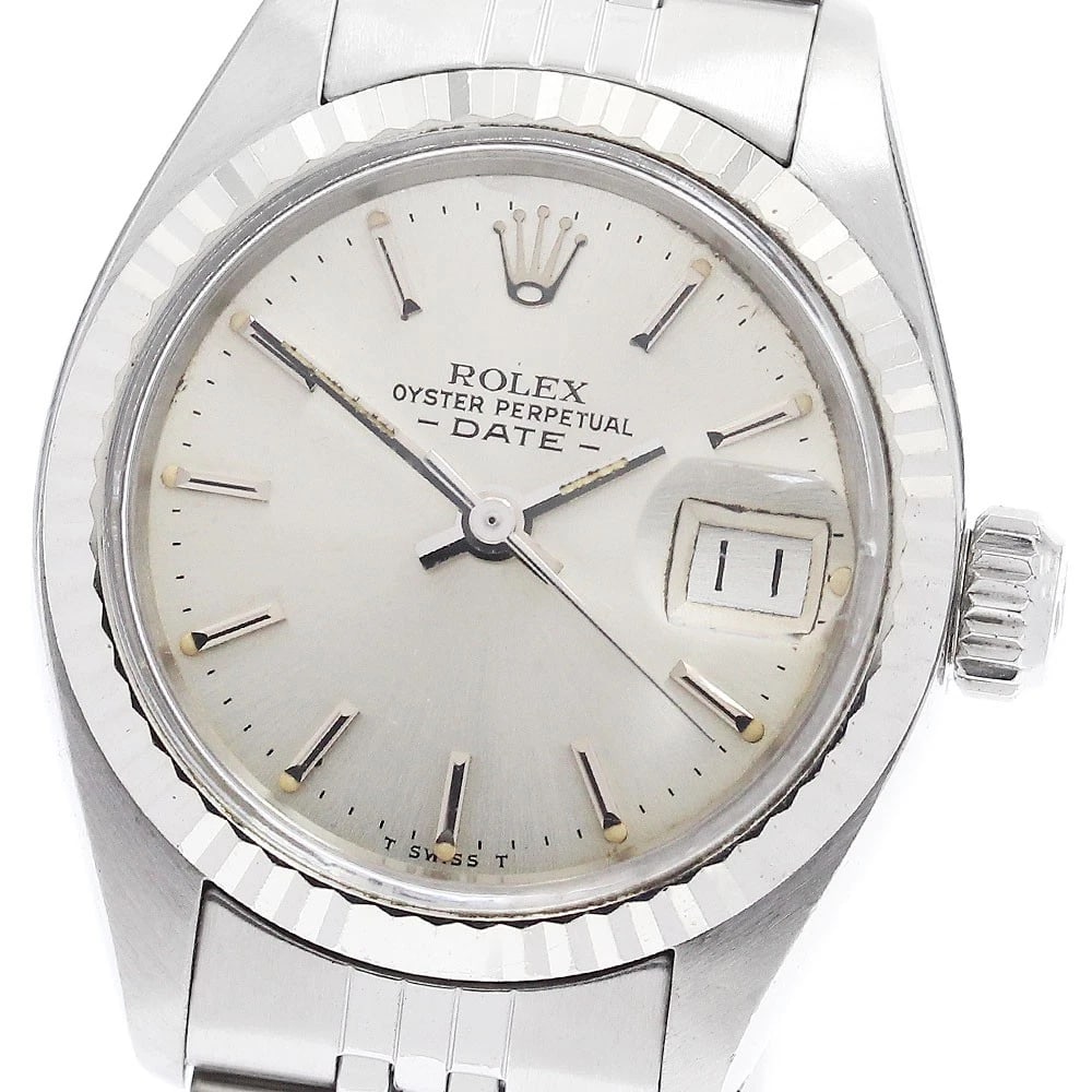 ROLEX OYSTER PERPETUAL DATE WG BEZEL AUTOMATIC WATCH: ROLEX Oyster Perpetual Date WG bezel Automatic Watch Brand: ROLEX Type/Style: Wristwatch Material: Band Material Stainless Steel, Case Material Stainless Steel/WG Color: Band Color Silver, Case Color
