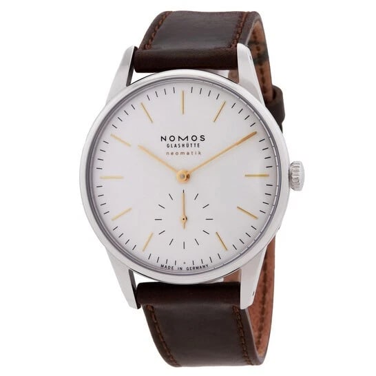 NOMOS ORION NEOMATIC DORE WATCH: NOMOS Orion Neomatic Dore Watch Brand: NOMOS Type/Style: Wristwatch Material: Case Material Stainless steel Color: Dial color Silver Size: Case diameter 36.4 mm Accessories: None Accessories Notice: