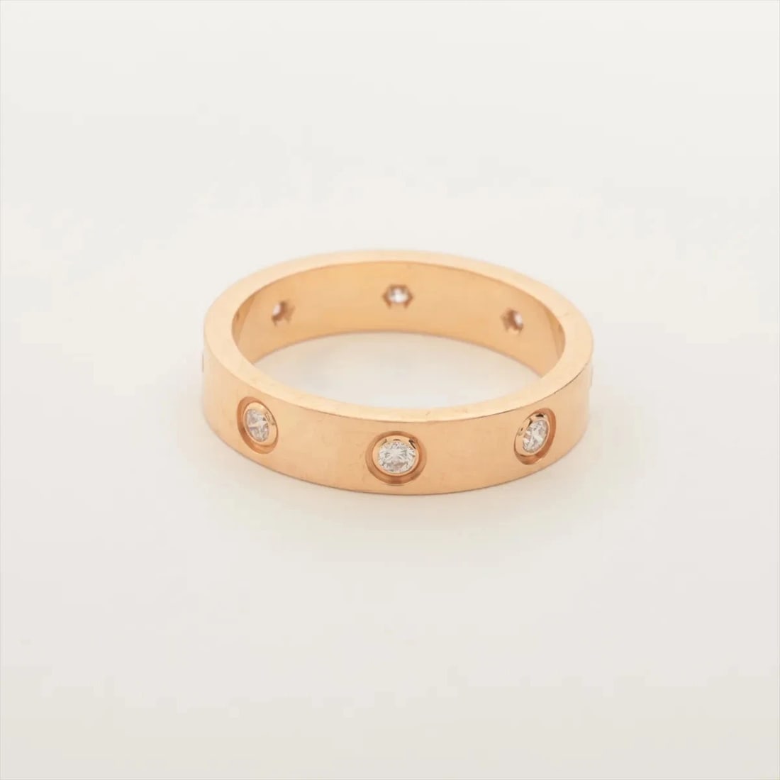 CARTIER MINI LOVE FULL DIAMOND RING 750(PG): Cartier Mini Love full diamond Ring 750(PG) Brand: Cartier Type/Style: Ring Material: 750(PG) Color: PG Size: 5.25 - 5.5 US Accessories: None Accessories Notice: When purchasing pre-owned goods,