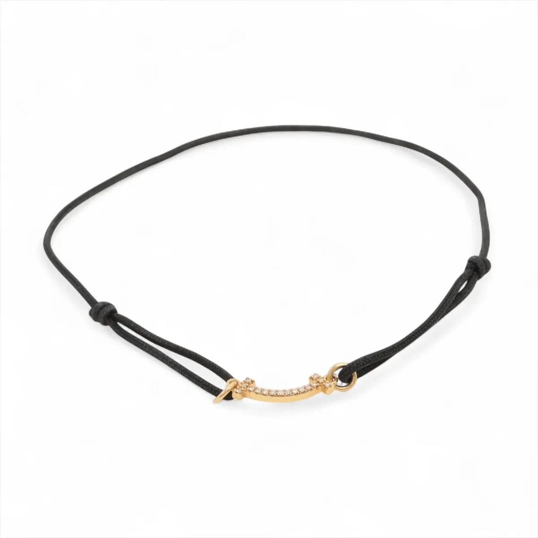 TIFFANY T SMILE MINI DIAMOND CORD BRACELET 750(YG): Tiffany T Smile Mini diamond Cord bracelet 750(YG) Brand: Tiffany Type/Style: Bracelet Material: 750(YG) Color: Yellow Gold Size: Bracelet length:20cm Accessories: None Accessories Notice:
