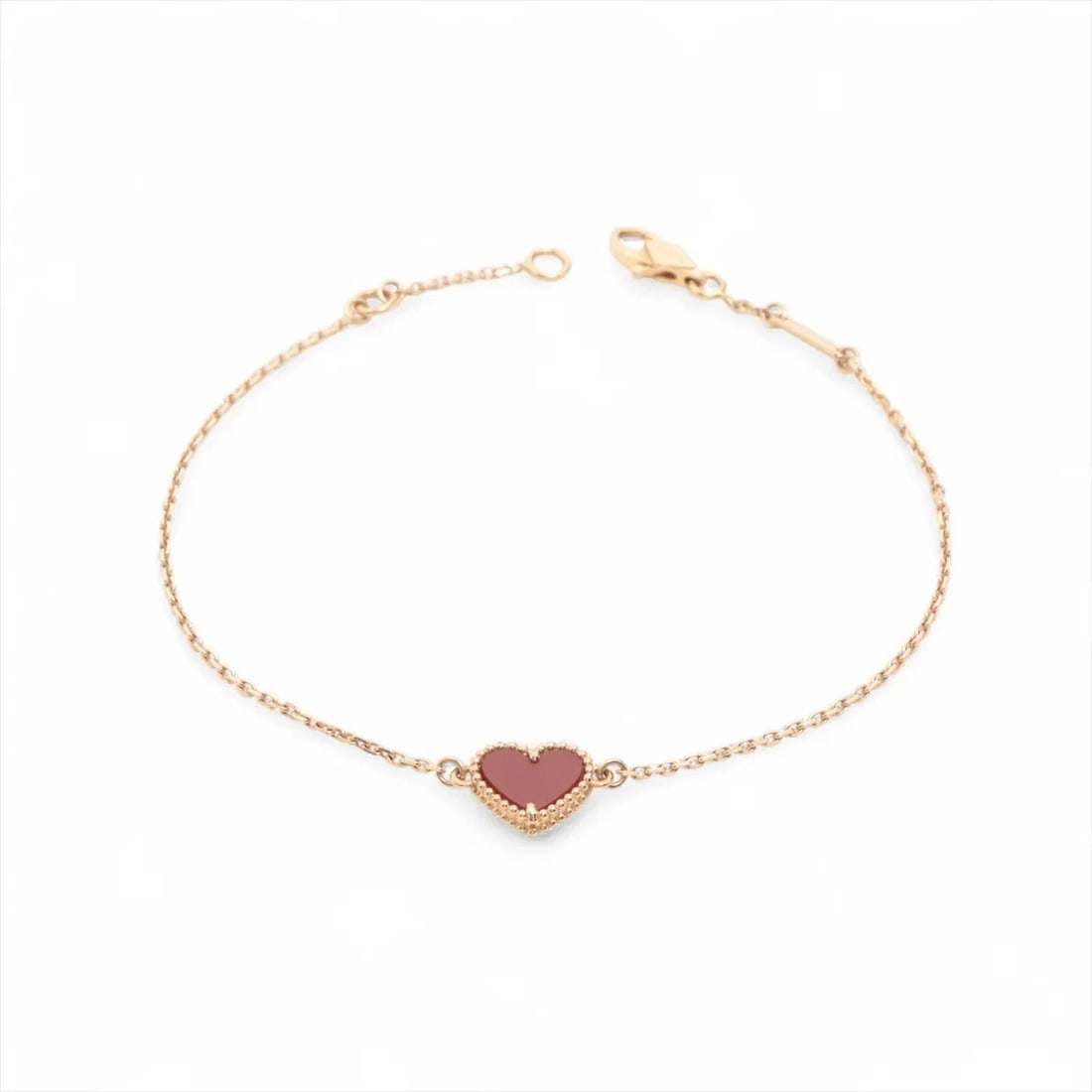 VAN CLEEF & ARPELS SWEET ALHAMBRA HEARTS CARNELIAN BRACELET 750(PG): Van Cleef & Arpels Sweet Alhambra hearts Carnelian Bracelet 750(PG) Brand: Van Cleef & Arpels Type/Style: Bracelet Material: 750(PG) Color: Pink Gold Size: Bracelet length:17.8cm Accessories: None