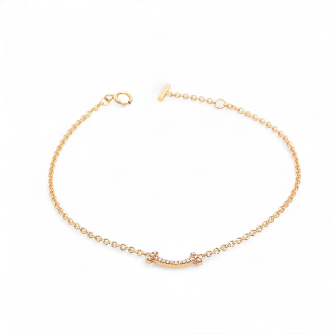 TIFFANY T SMILE MINI DIAMOND BRACELET 750(PG): Tiffany T Smile Mini diamond Bracelet 750(PG) Brand: Tiffany Type/Style: Bracelet Material: 750(PG) Color: PG Size: Bracelet length:16.5cm Accessories: None Accessories Notice: When purcha