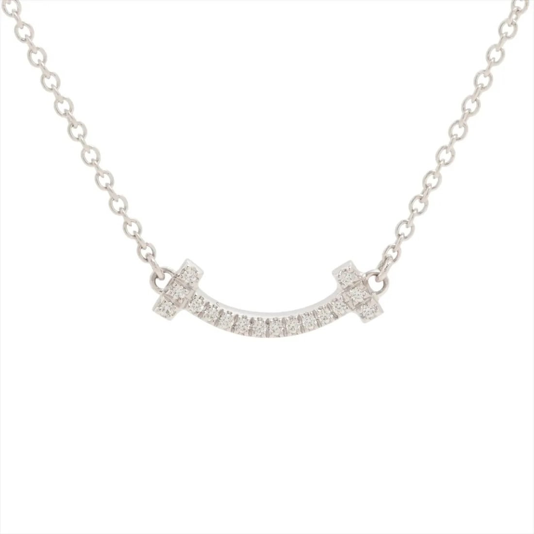 TIFFANY T SMILE MINI DIAMOND NECKLACE 750(WG): Tiffany T Smile Mini diamond Necklace 750(WG) Brand: Tiffany Type/Style: Necklace Material: 750(WG) Color: White Gold Size: Chain length:45.6cm Accessories: None Accessories Notice: When purchasing
