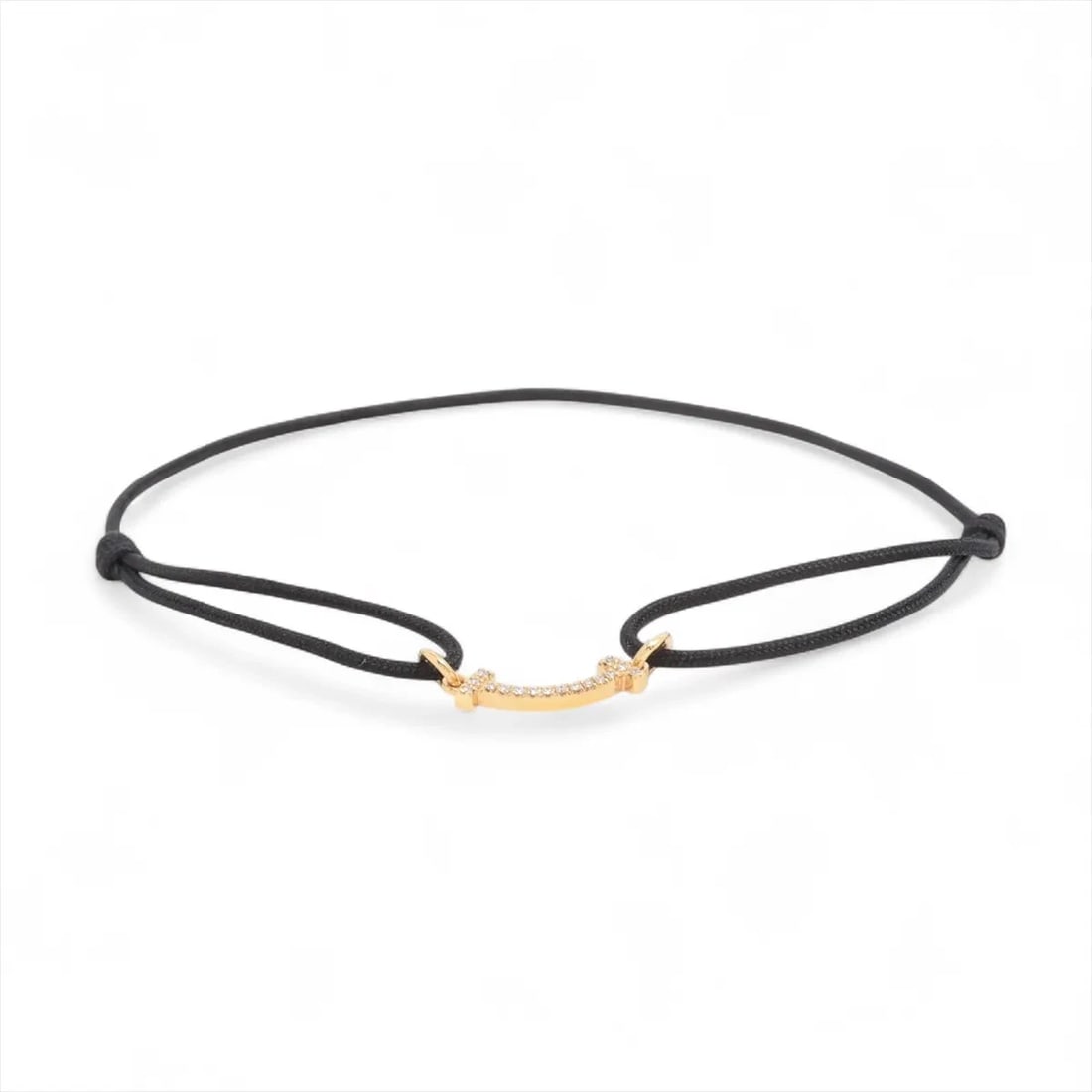 TIFFANY T SMILE MINI DIAMOND CORD BRACELET 750(YG): Tiffany T Smile Mini diamond Cord bracelet 750(YG) Brand: Tiffany Type/Style: Bracelet Material: 750(YG) Color: YG Size: Bracelet length:19.1cm Accessories: None Accessories Notice: When purchasing