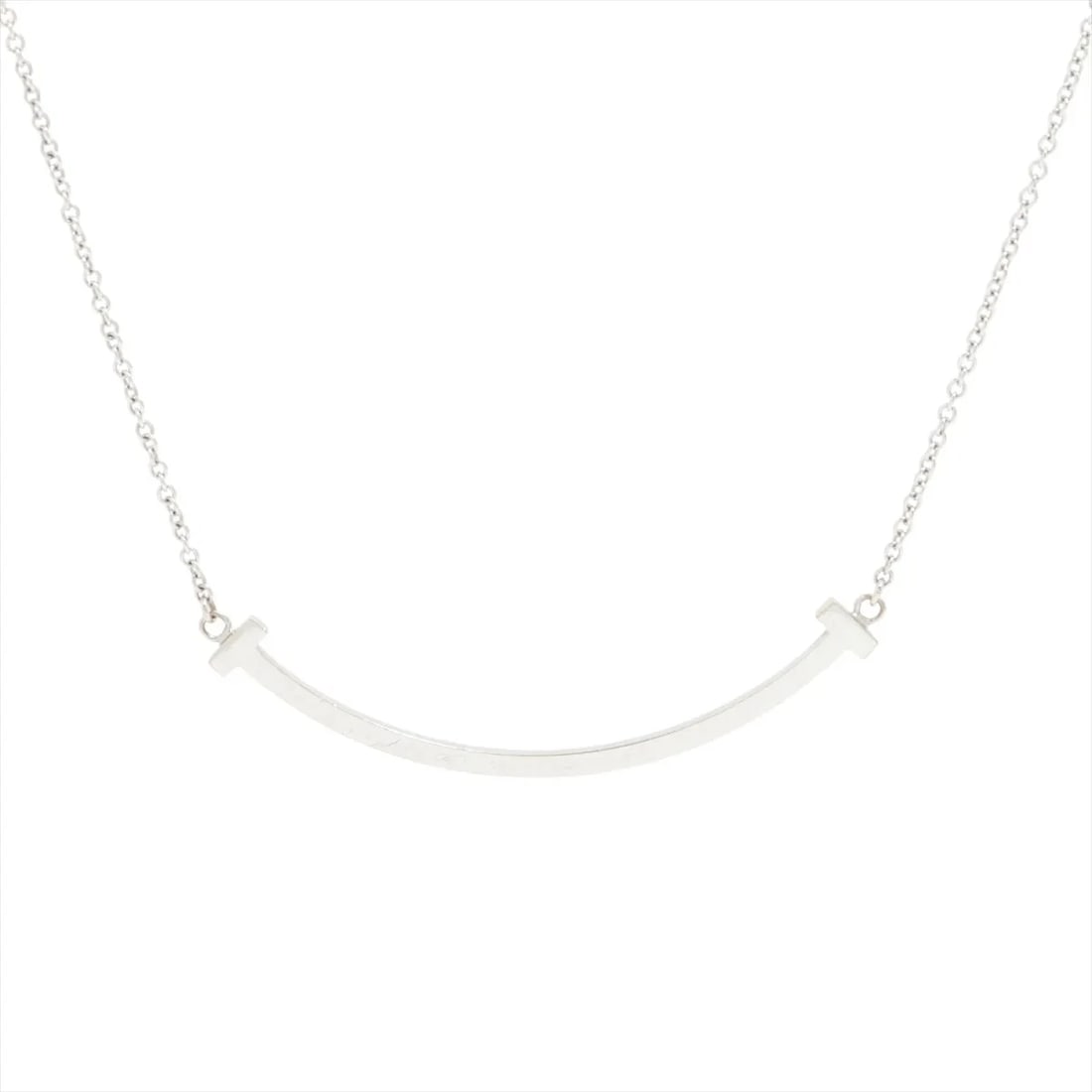 TIFFANY T SMILE SMALL NECKLACE 750(WG): Tiffany T Smile Small Necklace 750(WG) Brand: Tiffany Type/Style: Necklace Material: 750(WG) Color: White Gold Size: Chain length:46cm Accessories: None Accessories Notice: When purchasing pre-owned