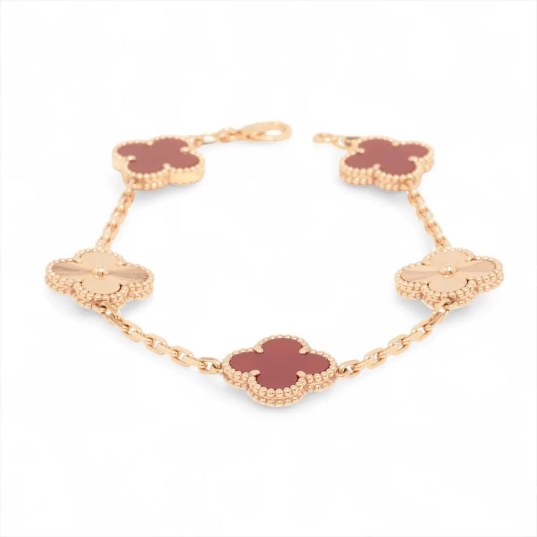 VAN CLEEF & ARPELS ALHAMBRA GUILLOCHE CARNELIAN BRACELET 750(PG): Van Cleef & Arpels Alhambra Guilloche Carnelian Bracelet 750(PG) Brand: Van Cleef & Arpels Type/Style: Bracelet Material: 750(PG) Color: pink gold Size: Bracelet length:19.2cm Accessories: None