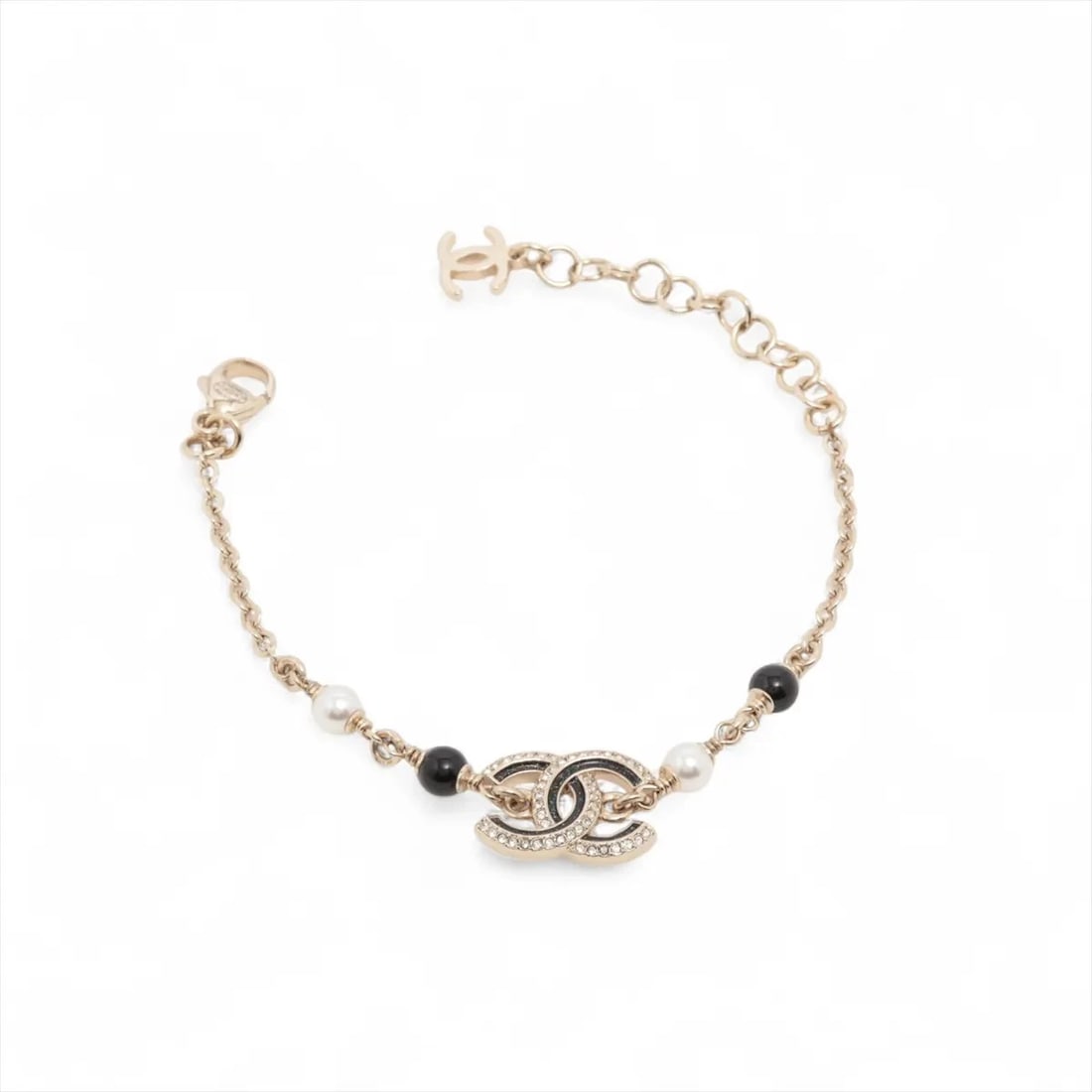 CHANEL COCO MARK BRACELET GP X RHINESTONE X IMITATION PEARL GOLD?BLACK: Chanel Coco Mark Bracelet GP x rhinestone x imitation pearl gold?black Brand: Chanel Type/Style: Bracelet Material: GP x rhinestone x imitation pearl Color: Gold /Black Size: Bracelet length:18.5cm