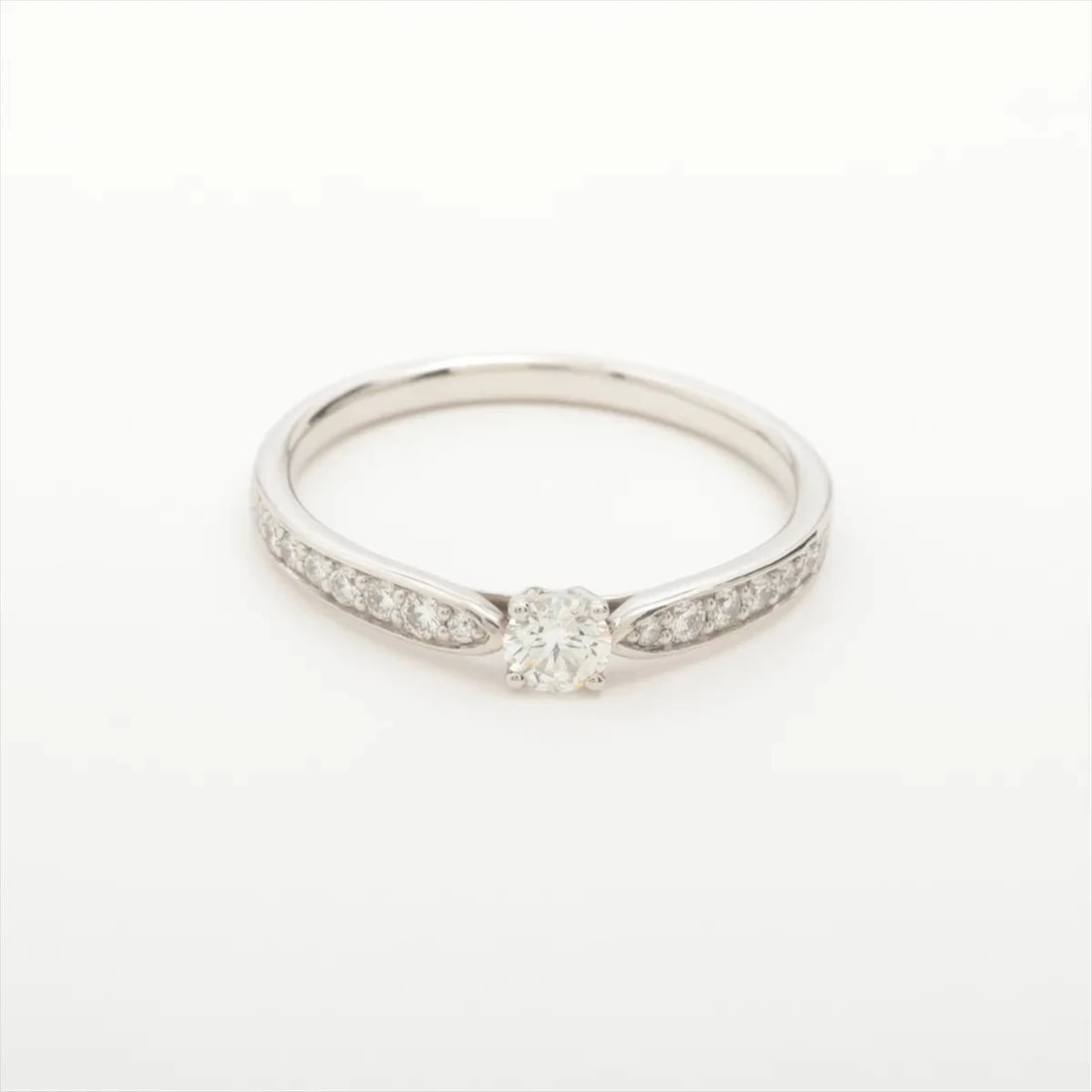 TIFFANY HARMONY HALF CIRCLE DIAMOND RING PT950: Tiffany Harmony Half Circle diamond Ring Pt950 Brand: Tiffany Type/Style: Ring Material: Pt950 Color: Silver Size: 7.5 US Accessories: None Accessories Notice: When purchasing pre-owned goods, please