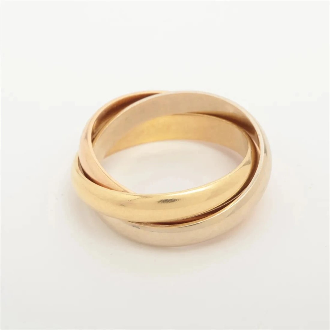 CARTIER TRINITY RING 750(YG?PG?WG): Cartier Trinity Ring 750(YG?PG?WG) Brand: Cartier Type/Style: Ring Material: 750(YG?PG?WG) Color: YG?PG?WG Size: 6.5 - 6.75 US Accessories: None Accessories Notice: When purchasing pre-own